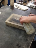 Etching the stone.